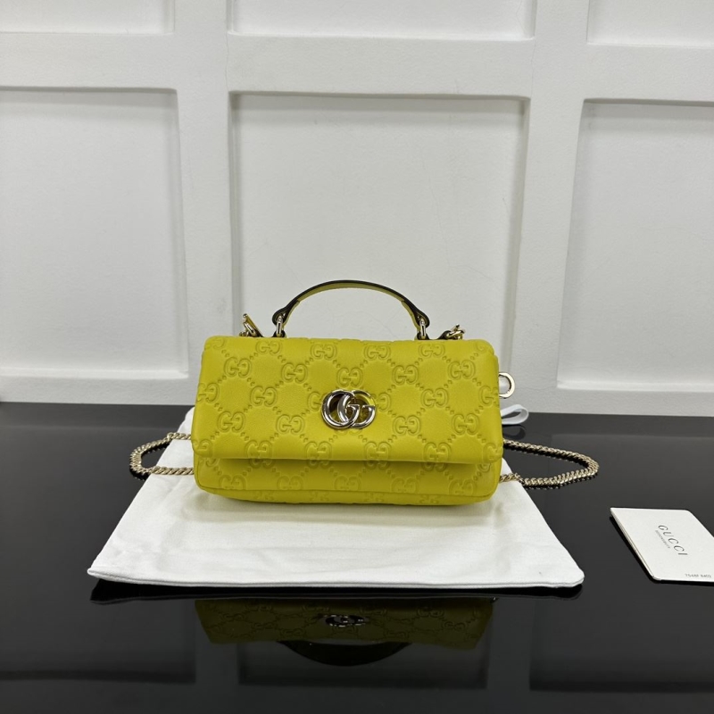 G*u*i top handle bags